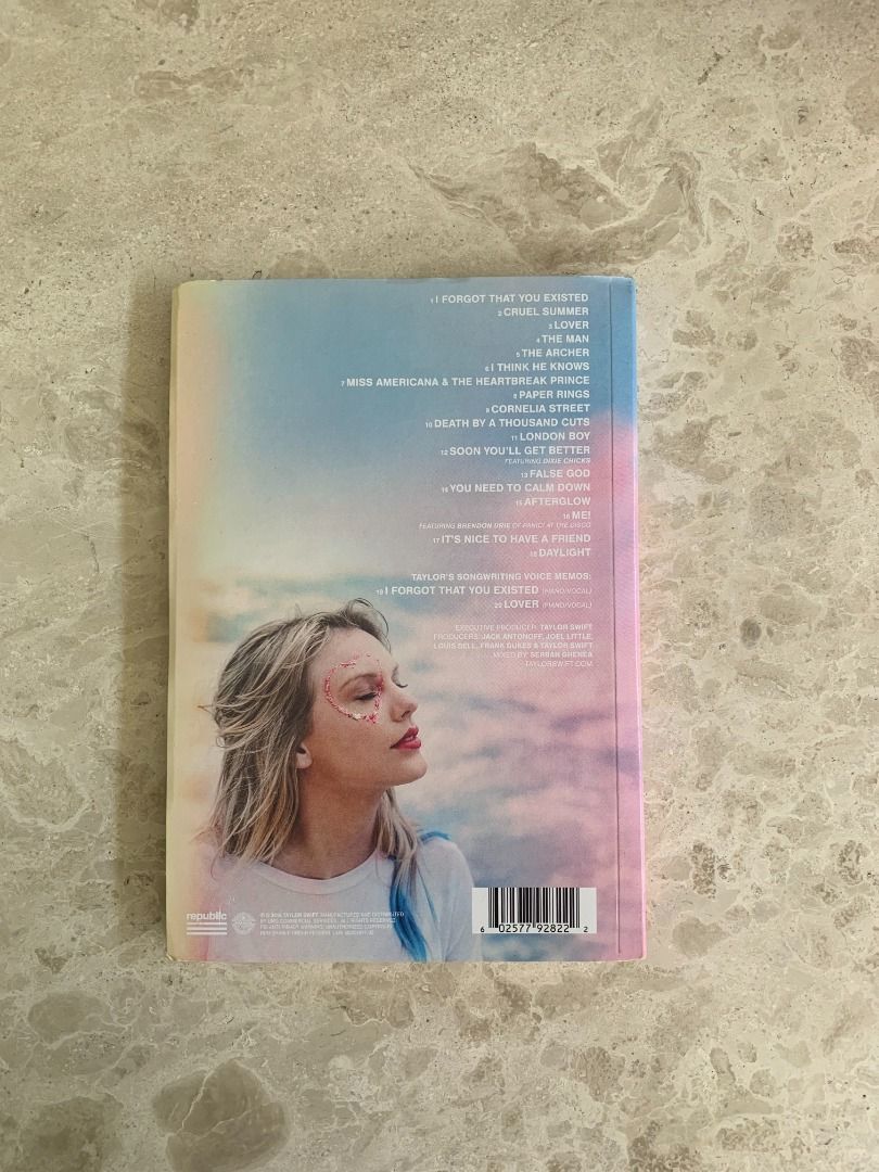 Taylor Swift Lover Deluxe Album Version 4 CD (Category: CDs & DVDs) located in Makati City. Submitted by shopwithmeraki_ (Listing ID 1456807758, Image 3). Description: Decluttering 📍 Location: Makati City • Item: Lover Deluxe Album • Variant: Version 4 • Condition: Fair (Unsealed, with minimal dent); Including poster and CD • Selling price: ₱1,000 • *Payment first*; Payment methods: GCash / Maribank / Maya / GoTyme / QRPH / Bank Transfer • Deliv