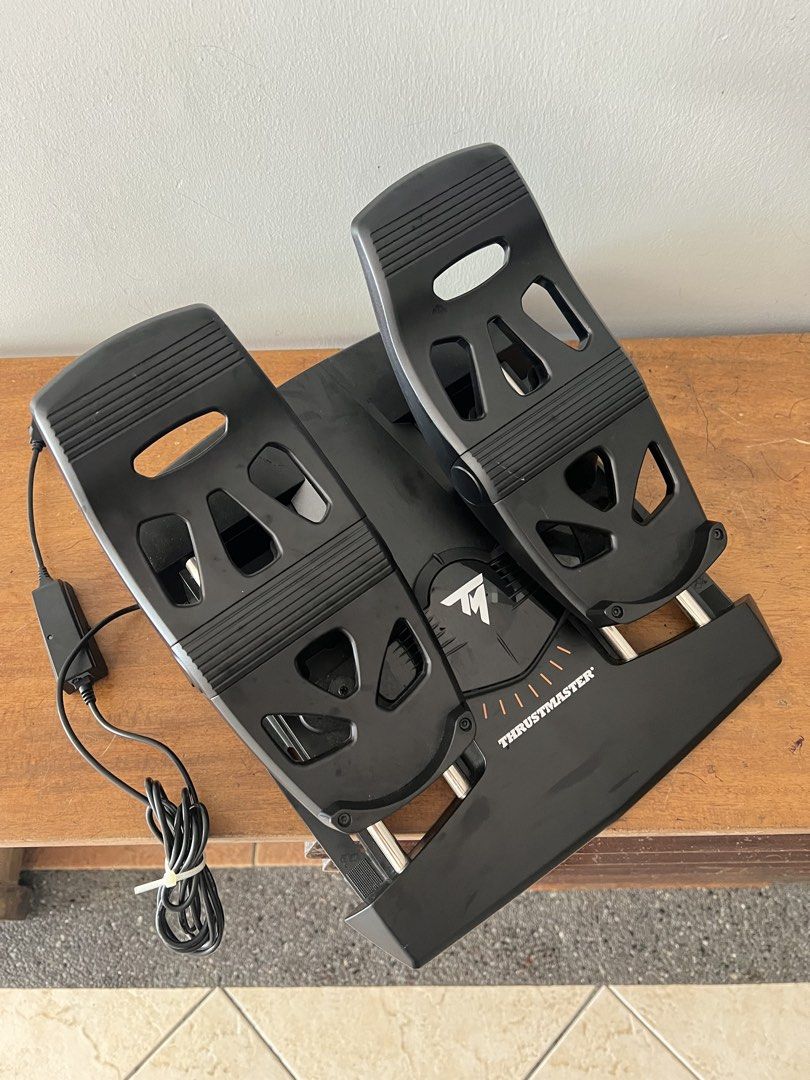 Thrustmaster t.flight Rudder Pedals (Category: Controllers) located in Malabon City. Submitted by inigomrtn (Listing ID 1456793817, Image 2). Description: [FOR SALE] Thrustmaster T.Flight Rudder Pedals (USED) P5,950 negotiable Condition 10/10 Only used for flight training and simulation No issues With box and receipt Bought from Datablitz - One Bonifacio High Street RFS - upgrading Location - Acacia Estates, Taguig City.