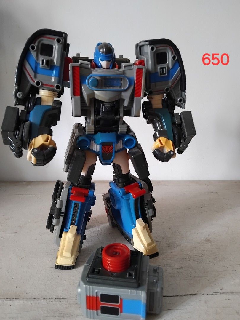 Tobots dx (Category: Action & Battle Toys) located in San Fernando. Submitted by imlikeabird (Listing ID 1456801737, Image 2). Description: - Two awesome Transformer robot action figures available! - Red robot transforms into a cool car. - Blue robot includes a separate accessory. - Perfect for both dedicated collectors and kids who love Transformers. - Price listed is for each individual toy..