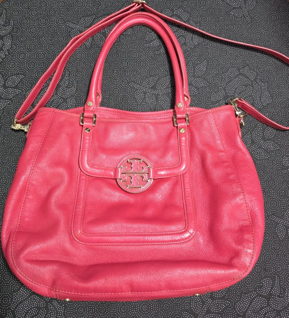 Tory Burch Pink Leather Tote Bag (Category: Luxury Bags & Wallets) located in Manila. Submitted by gentlewind_91c54e (Listing ID 1456886873, Image 1). Description: - Genuine pink leather Tory Burch tote bag - Versatile with top handles and a detachable shoulder strap - Interior includes multiple pockets and a secure zip compartment - Elegant gold hardware details - Ideal for everyday style and functionality.