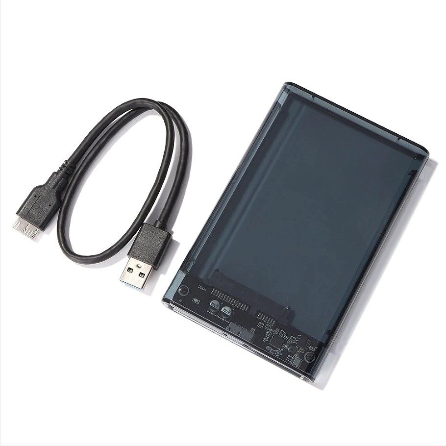 Transparent External HDD SSD Enclosure with USB Cable (Category: Hard Disks & Thumbdrives) located in Santa Rosa. Submitted by keendeer.6c83cc (Listing ID 1456827163, Image 1). Description: - USB 2.5" Hard Drive or SSD Enclosure - Dark, transparent design to view internal components - Easy plug-and-play with included USB cable - Ideal for repurposing old hard drives - Create your own portable storage solution.