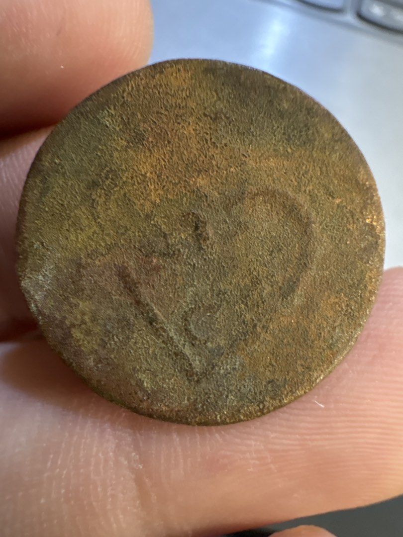 VEIC Java 1 duit (Category: Currency) located in Cheras. Submitted by mr_jadon (Listing ID 1456810551, Image 1). Description: - Unique vintage coin - Features a heart design on one side - Other side has faded numerical markings - Perfect for coin collectors or as a distinctive decorative item.