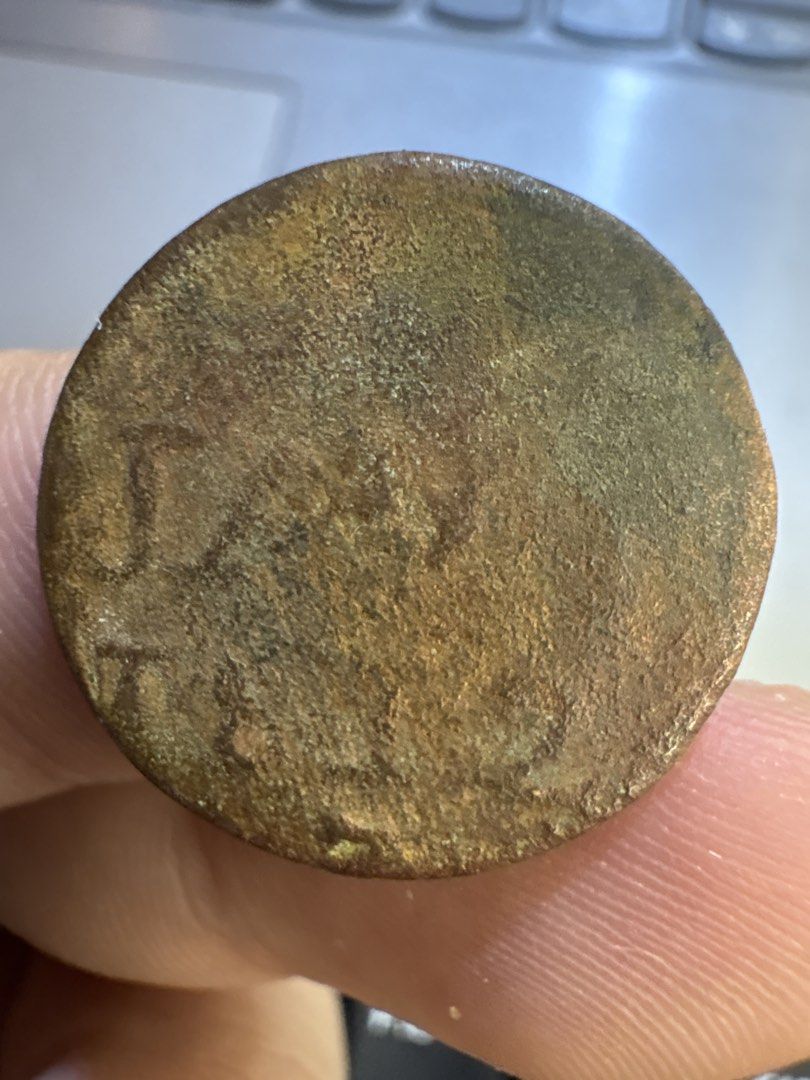 VEIC Java 1 duit (Category: Currency) located in Cheras. Submitted by mr_jadon (Listing ID 1456810551, Image 2). Description: - Unique vintage coin - Features a heart design on one side - Other side has faded numerical markings - Perfect for coin collectors or as a distinctive decorative item.