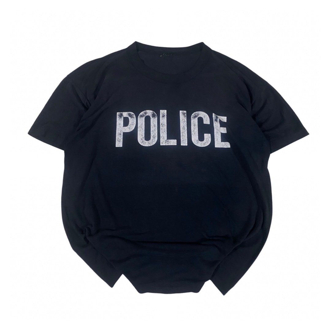 Vintage 90s Police Tshirt (Category: Tshirts & Polo Shirts ) located in Los Banos. Submitted by adothrift (Listing ID 1456947348, Image 1). Description: Vintage 90s Police Tshirt Size: L-XL Dimensions: Width - 25 Length - 29 .
