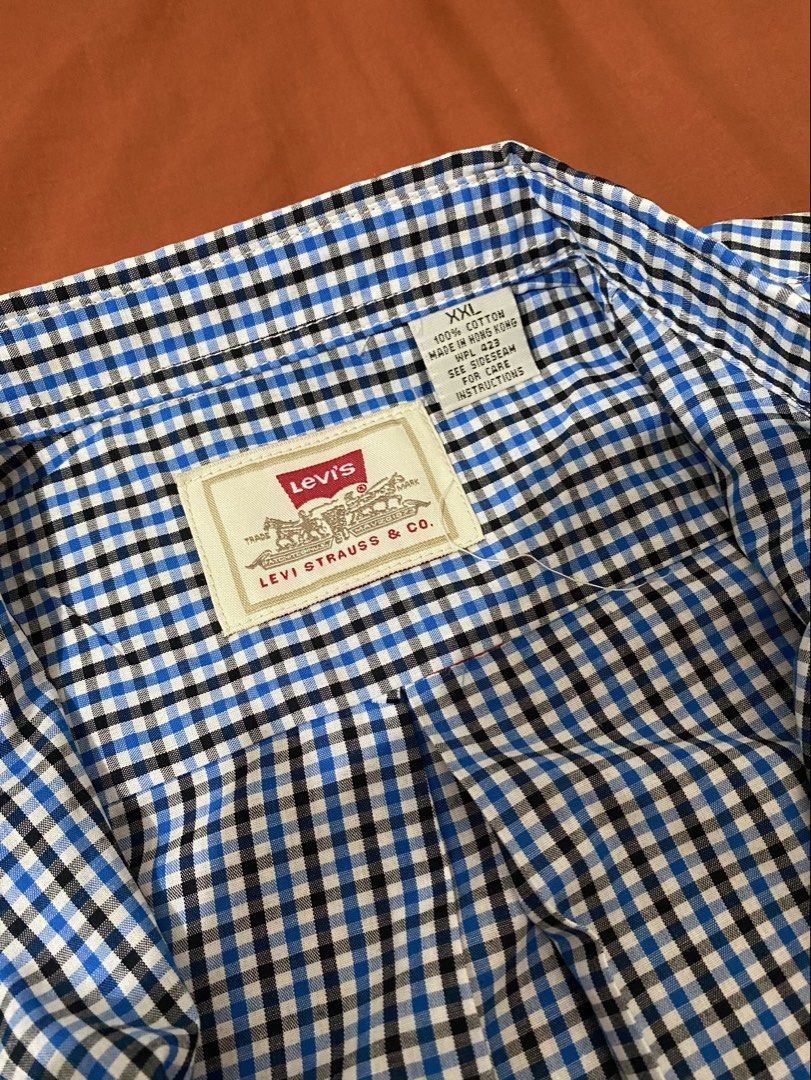 vintage Levi's short-sleeve button-up shirt (Category: Others Tops) located in Subic. Submitted by shes2pid_ (Listing ID 1456832998, Image 3). Description: vintage Levi’s short-sleeve button-up shirt ~ xs to small (xxl on tag - kids size) ~ with original tags ~ not yet used, worn sa mannequin lang :).
