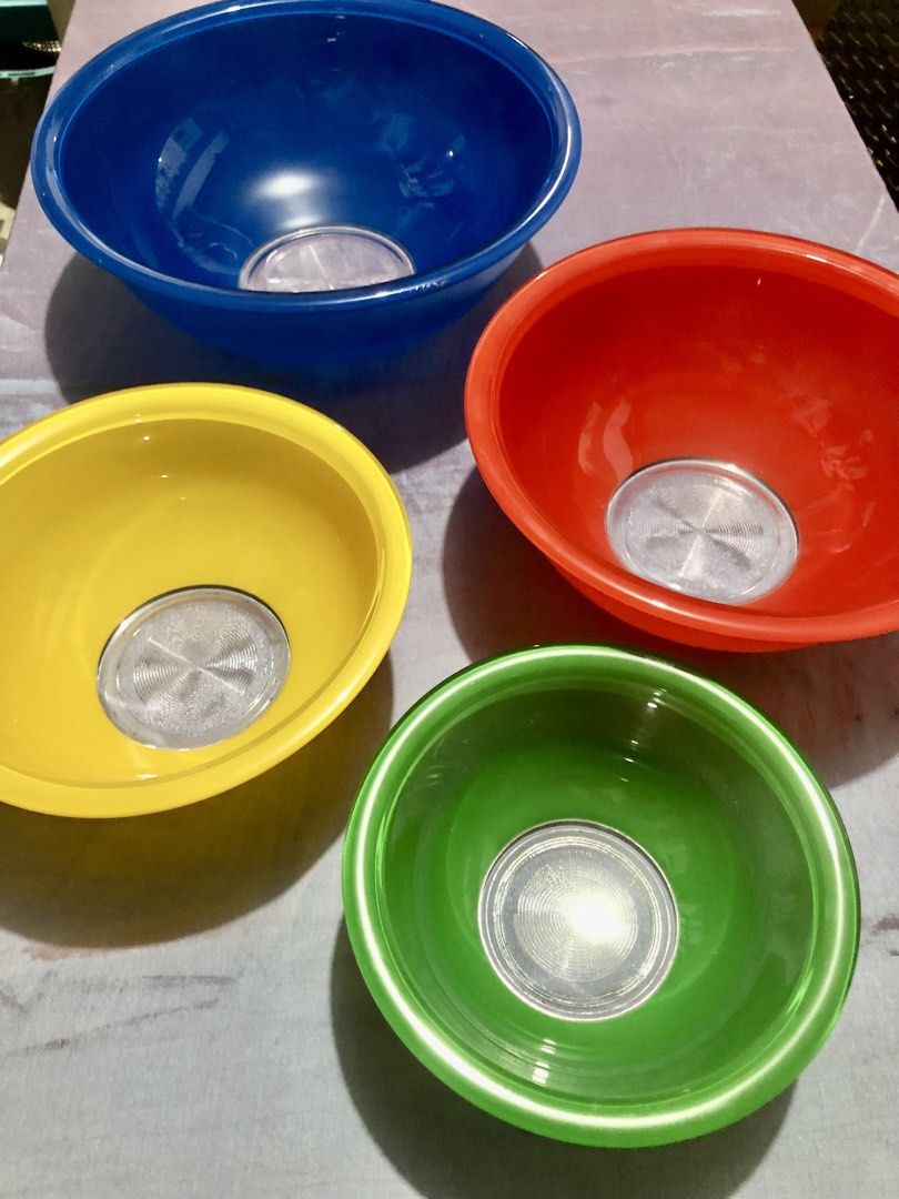Vintage Pyrex Rainbow Nesting Mixing Bowl Set (Category: Other Kitchenware & Tableware) located in Quezon City. Submitted by unique_vintage_shop (Listing ID 1456920368, Image 1). Description: P3500 - 4 Piece Set Vintage Pyrex Rainbow nesting mixing bowls with clear glass bottoms, featuring 4 colorful bowls in blue, red, yellow, and green. Condition: Pre-owned vintage condition with normal sign of age and use. Please review all photos closes as th