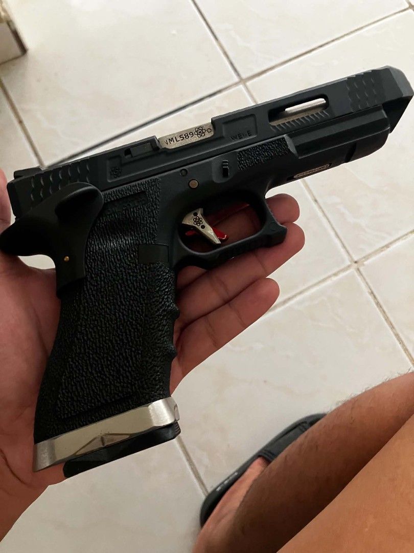 WE GBB Airsoft Pistol with Magazine (Category: Combat Sports) located in Manila. Submitted by jc_parker (Listing ID 1456883866, Image 1). Description: - WE G34 tmss GBB Pistol - Durable Metal Slide - Textured Grip for secure handling - Eye-catching Red Trigger - Comes with 1 Magazine - Ideal for Collection or Airsoft Play.