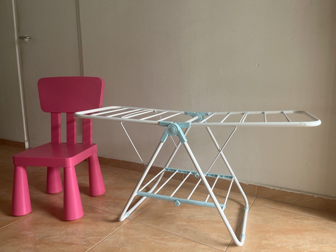 White Drying Rack only (Category: Shelves, Cabinets & Racks) located in Singapore. Submitted by premiumlian (Listing ID 1456815313, Image 1). Description: - Pink IKEA Kids Chair not selling only to compare - White Foldable Drying Rack: Great for laundry, space-saving for sales.
