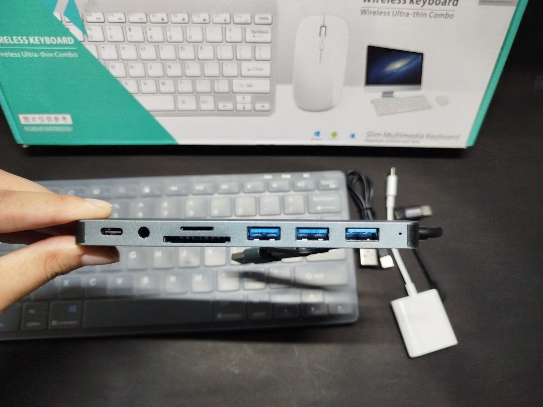 Wireless Slim Keyboard with inclusions (Category: Computer Keyboard) located in Dagupan City. Submitted by gigi.qfyer1 (Listing ID 1456881892, Image 3). Description: GET ALL FOR PHP 1,500 -Wireless Slim Keyboard with charger cord (used only once, good as new) -8in1 USB Adapter -OTG Card Reader (type c) -OTG Adapter (ios to type c) -Price is negotiable RF: need funds for tf.
