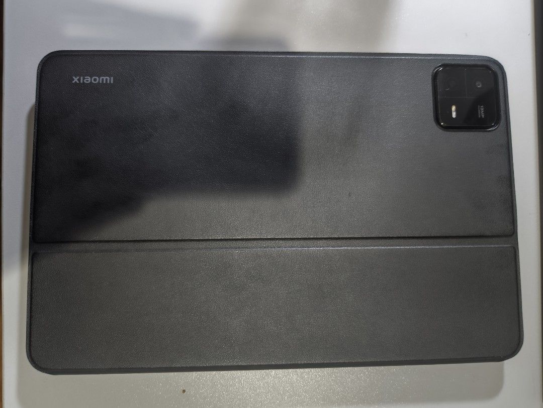 Xiaomi Pad 6 with Official Keyboard Case (Category: Android) located in Quezon City. Submitted by karcruz (Listing ID 1456874924, Image 2). Description: - Xiaomi Tablet with magnetic keyboard case for enhanced productivity - Tablet only = 9.5k, keyboard case only = 1.8k, both = 10.5k - Ideal for both work and entertainment on the go - Features a sleek and modern design - Equipped with a rear camera - Minor corner damage (see photo), performance/f