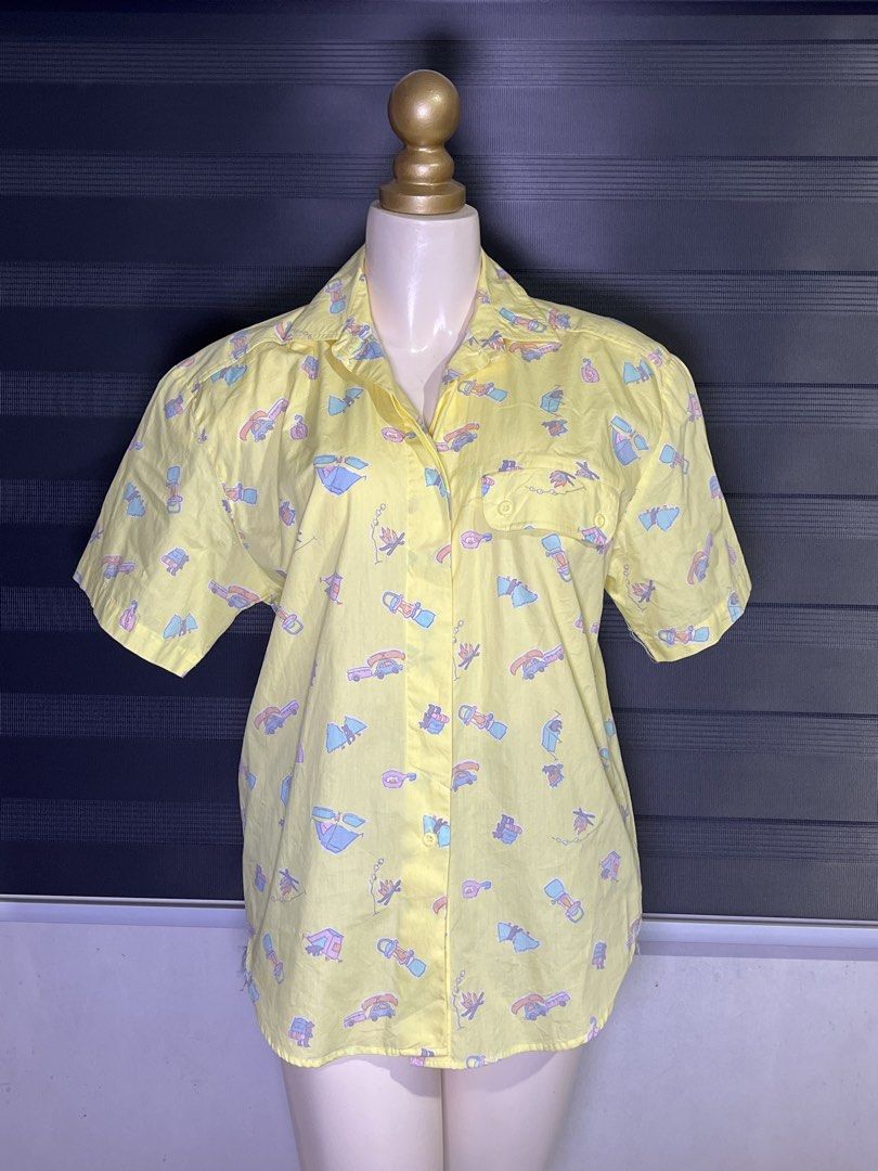 Yellow Short Sleeve Button Up Shirt with Fun Print (Category: Shirts) located in Caloocan City. Submitted by unicakczxc (Listing ID 1456910830, Image 2). Description: - Cute yellow short sleeve button-up shirt - Fun all-over print with camping and outdoor elements - Perfect for casual wear - Made of 100% cotton - Brand: SK & Company Shoulder padded XL.