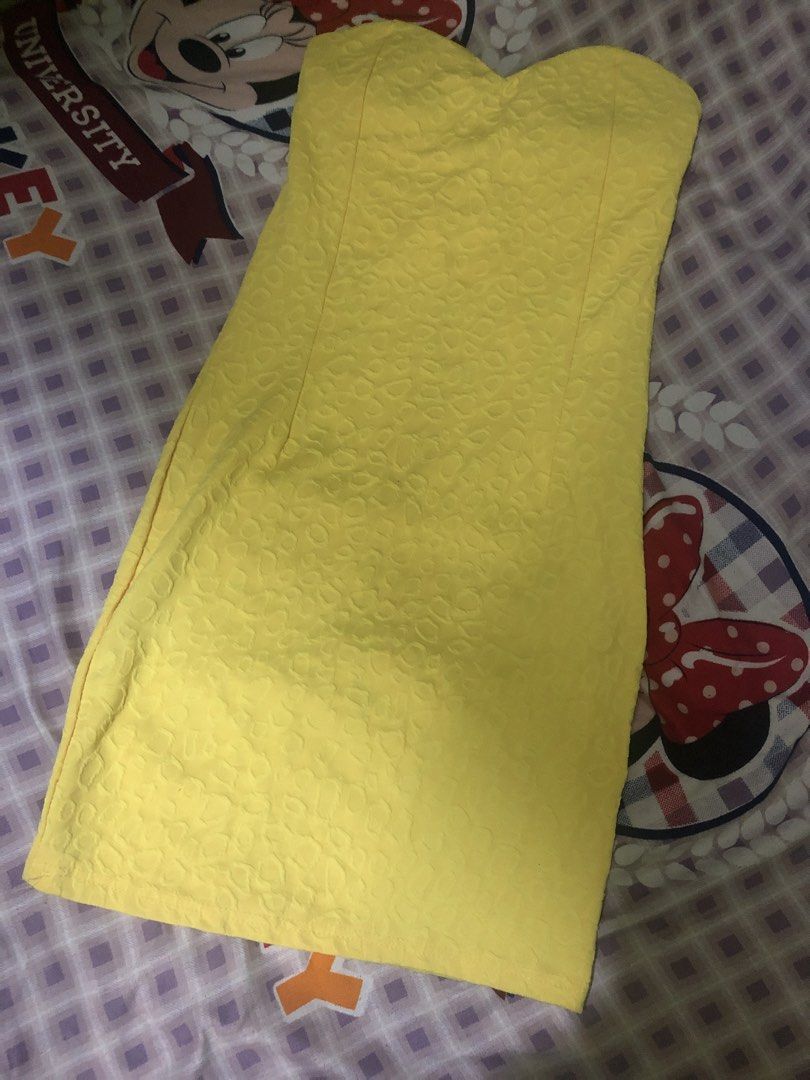 Yellow Strapless Textured Bodycon Dress (Category: Dresses) located in Caloocan City. Submitted by JennMT (Listing ID 1456954349, Image 1). Description: - Bright yellow strapless dress - Textured fabric all over - Bodycon fit - Ideal for parties or a night out - Versatile: easy to dress up or down.