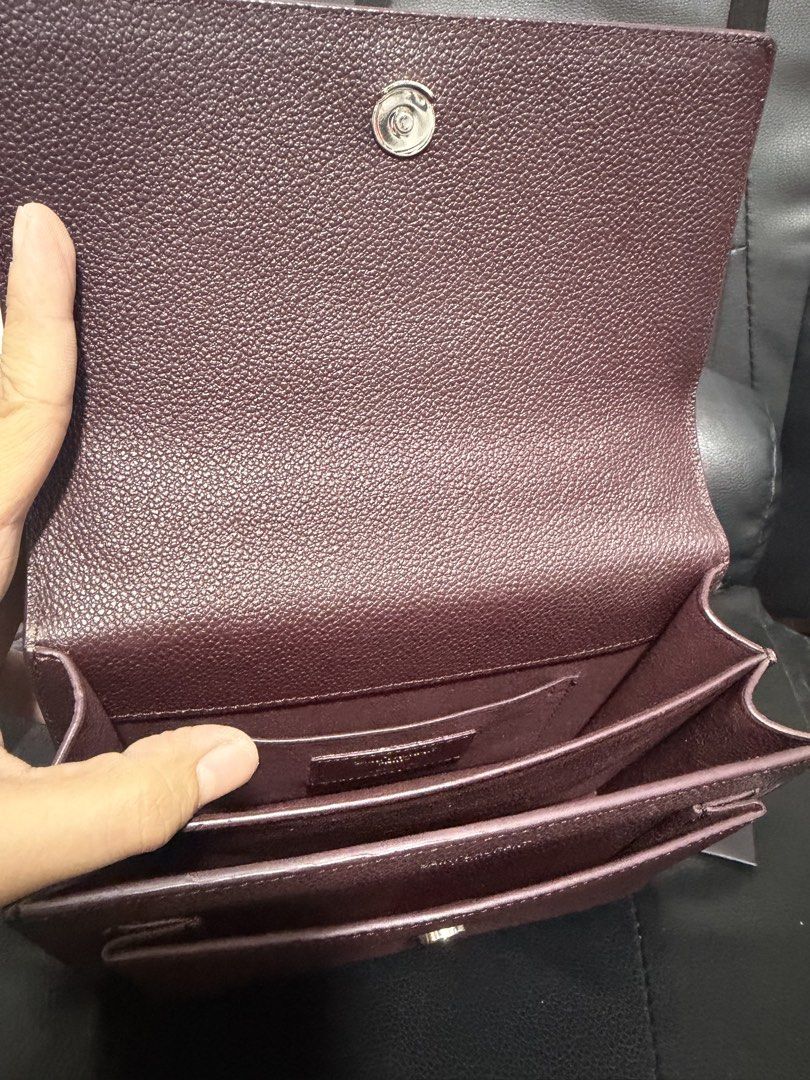 YSL Sunset (Category: Luxury Bags & Wallets) located in Antipolo. Submitted by declutteringirlie0317 (Listing ID 1456934882, Image 3). Description: -Maroon color -used once -with card care -silver strap intact -with code.