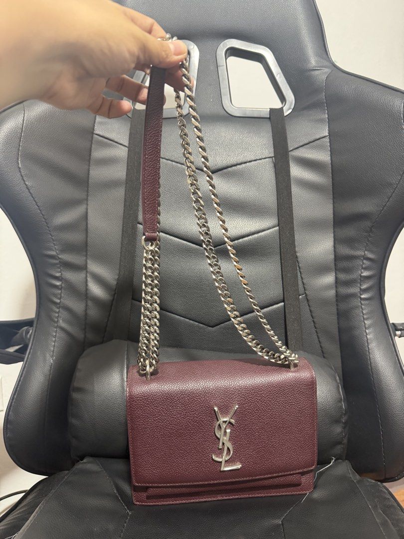 YSL Sunset (Category: Luxury Bags & Wallets) located in Antipolo. Submitted by declutteringirlie0317 (Listing ID 1456934882, Image 2). Description: -Maroon color -used once -with card care -silver strap intact -with code.
