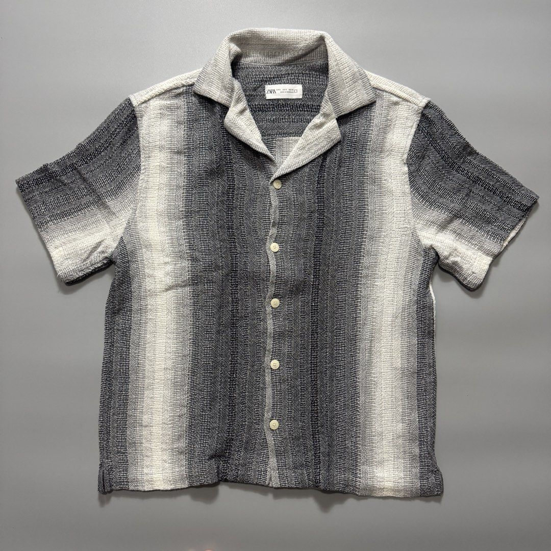 Zara Striped Short Sleeve Shirt (Category: Shirts) located in Santa Cruz. Submitted by bigsteppa.tiger (Listing ID 1456941715, Image 1). Description: Zara Knitted Shirt Textured knitted short-sleeve shirt with a relaxed fit and vintage-inspired striped pattern. Width – 20 Length – 26.