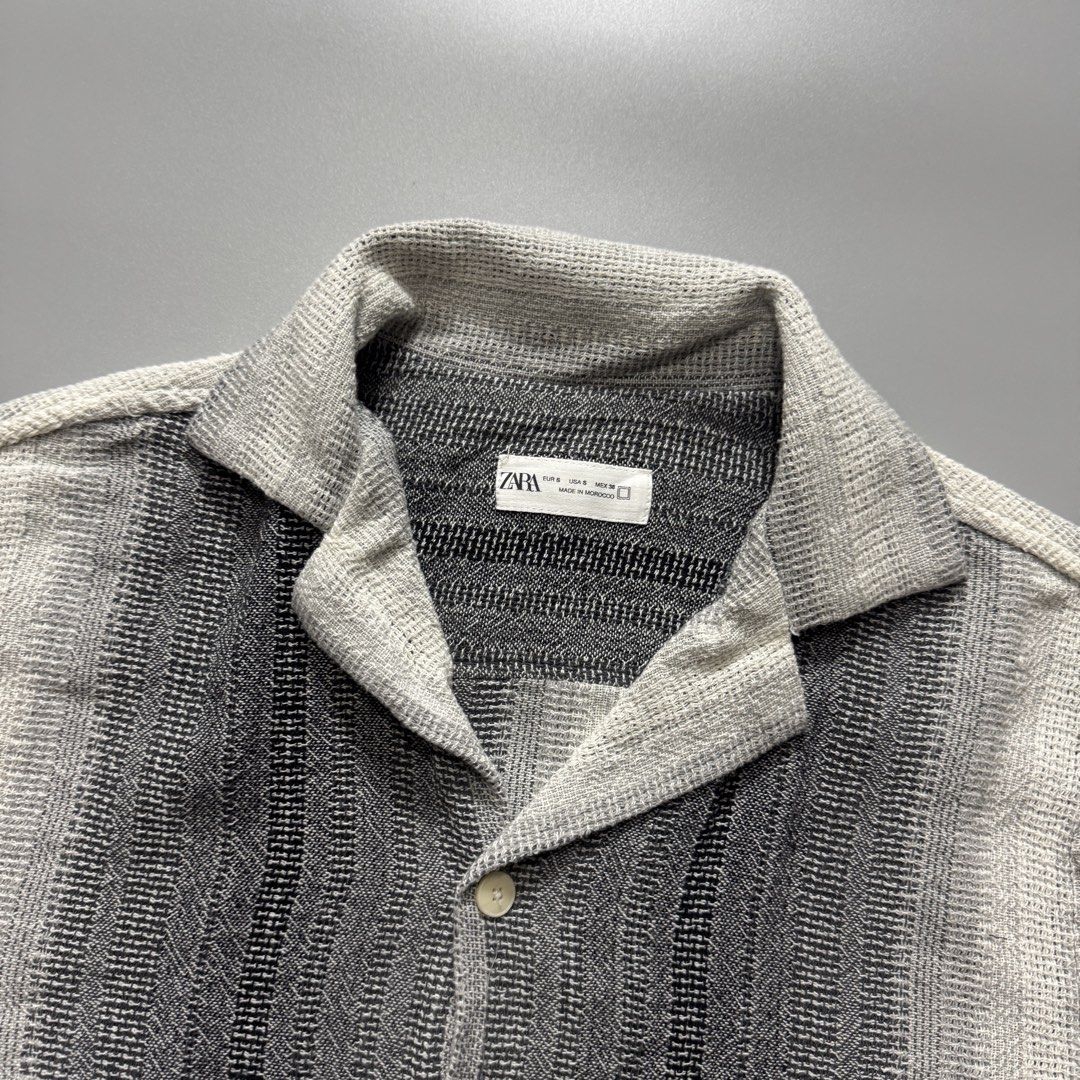 Zara Striped Short Sleeve Shirt (Category: Shirts) located in Santa Cruz. Submitted by bigsteppa.tiger (Listing ID 1456941715, Image 2). Description: Zara Knitted Shirt Textured knitted short-sleeve shirt with a relaxed fit and vintage-inspired striped pattern. Width – 20 Length – 26.