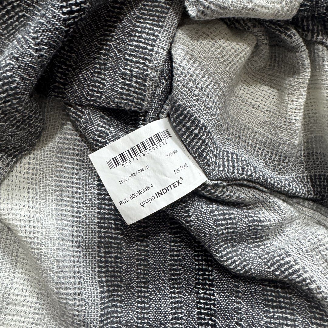 Zara Striped Short Sleeve Shirt (Category: Shirts) located in Santa Cruz. Submitted by bigsteppa.tiger (Listing ID 1456941715, Image 3). Description: Zara Knitted Shirt Textured knitted short-sleeve shirt with a relaxed fit and vintage-inspired striped pattern. Width – 20 Length – 26.