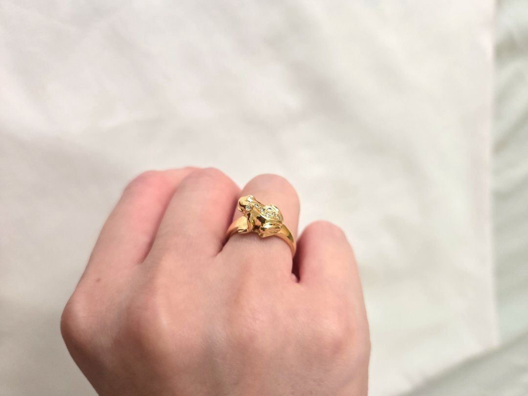 18K Gold 4.2g Frog Ring w/ Diamonds (Pawnable) (Category: Rings) located in Manila. Submitted by helpmedeclutter___ (Listing ID 1456913446, Image 1). Description: 18K real gold with 750 hallmark 4.2g weight Size US 6.5 / 17mm - Adorable frog design ring - Crafted from genuine gold - Features small, sparkling diamonds - Unique and eye-catching style - Versatile for any occasion - A fun addition to any outfit - Ideal for animal lovers.