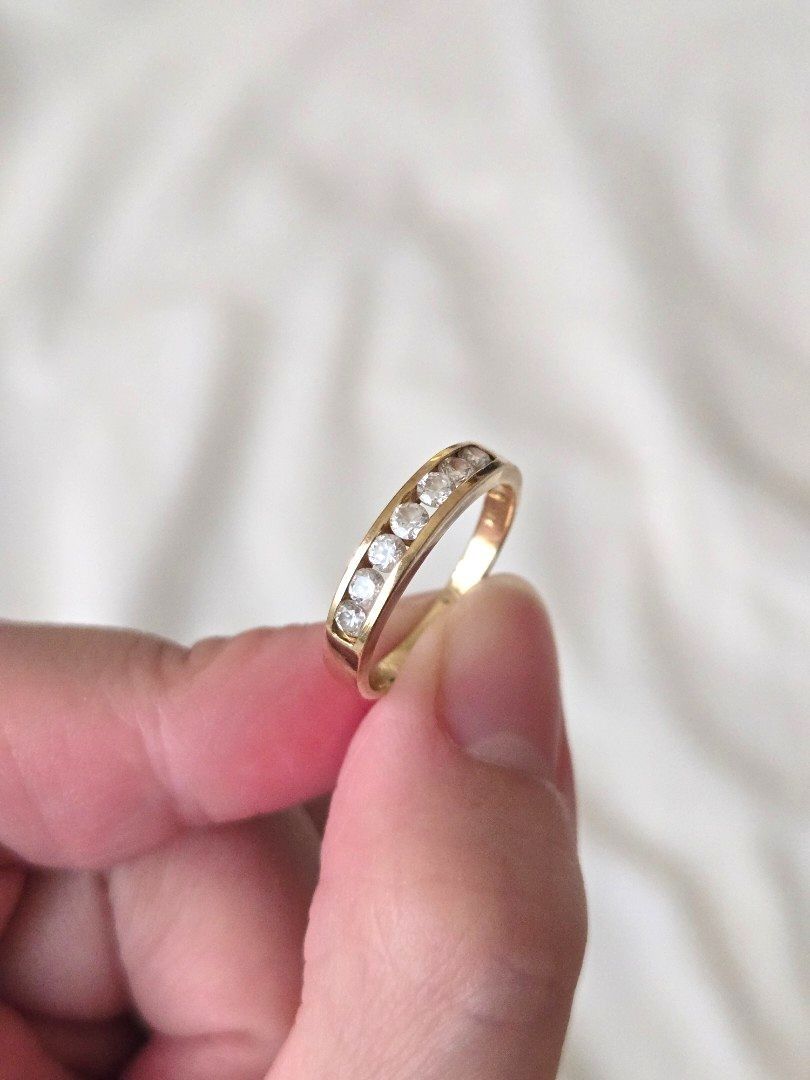18K Gold Ring w/ Diamonds 2.0g (Pawnable) (Category: Rings) located in Manila. Submitted by helpmedeclutter___ (Listing ID 1456918340, Image 1). Description: - Classic 18K gold band ring - Features small diamonds set all around - Ideal for stacking or wearing on its own - A versatile, timeless piece - 2.0g weight - size US 6.5 / 17mm - Pawnable.