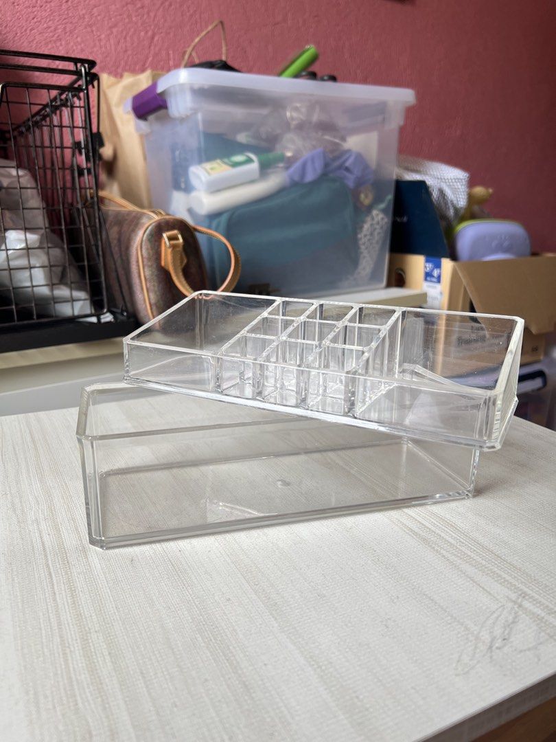 2-Layer Clear Acrylic Makeup Organizer (Category: Makeup) located in Quezon City. Submitted by kaye_mm (Listing ID 1457034320, Image 3). Description: - Two-piece clear acrylic organizer - Top tray with multiple compartments for lipsticks & small items - Deep lower layer for larger products - Stackable design for space-saving - Keeps vanity/desk tidy and organized - Ideal for makeup, skincare, or desk essentials.