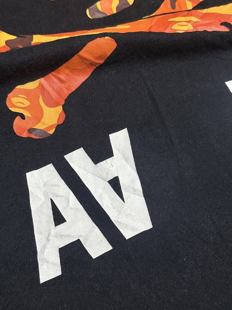 AAPE X BAPE ORANGE (Category: Activewear) located in Makati City. Submitted by js.street.finds (Listing ID 1457110353, Image 3). Description: Dimes 21/28 color rate 9.2/10 MINOR CRACK .