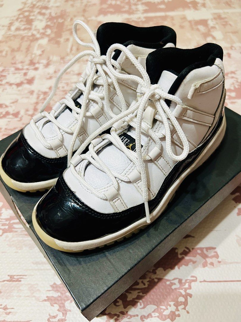 Air Jordan 11 Retro Gratitude Size 2Y (Category: Babies & Kids Fashion) located in Quezon City. Submitted by prettydollph (Listing ID 1457073428, Image 3). Description: - Classic Air Jordan 11s - White leather upper with black patent leather accents - Iconic and timeless design - Perfect for collectors or daily wear - Comes with the original box - Size 2Y - lightly used for indoor training (with normal creases and scratches- see photos).