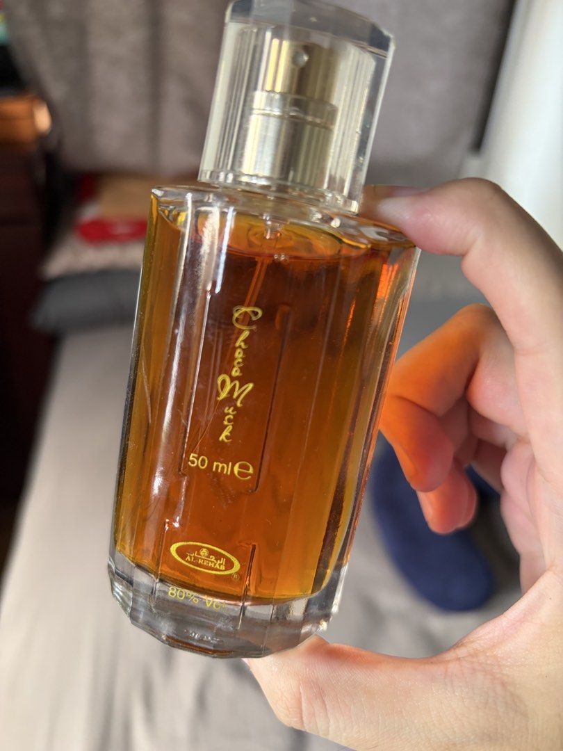 Al-Rehab Choco Musk Eau de Parfum 50ml (Category: Fragrance & Deodorants) located in Dasmarinas. Submitted by authenticlady (Listing ID 1457023952, Image 2). Description: - Choco Musk by Al-Rehab - Eau de Parfum, Natural Spray - 50ml bottle - Popular sweet, chocolatey fragrance - Clear glass bottle with gold accents - Original box included - used about 2x only .
