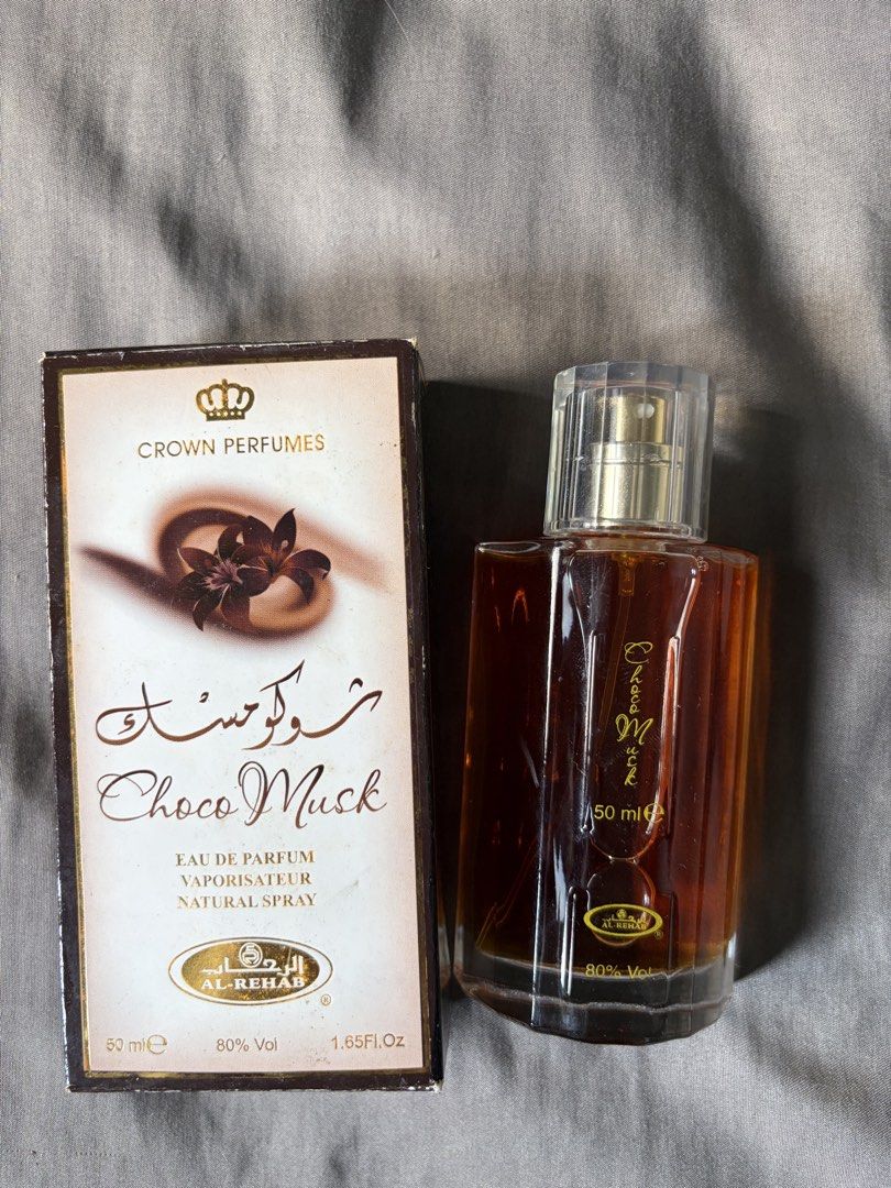 Al-Rehab Choco Musk Eau de Parfum 50ml (Category: Fragrance & Deodorants) located in Dasmarinas. Submitted by authenticlady (Listing ID 1457023952, Image 1). Description: - Choco Musk by Al-Rehab - Eau de Parfum, Natural Spray - 50ml bottle - Popular sweet, chocolatey fragrance - Clear glass bottle with gold accents - Original box included - used about 2x only .
