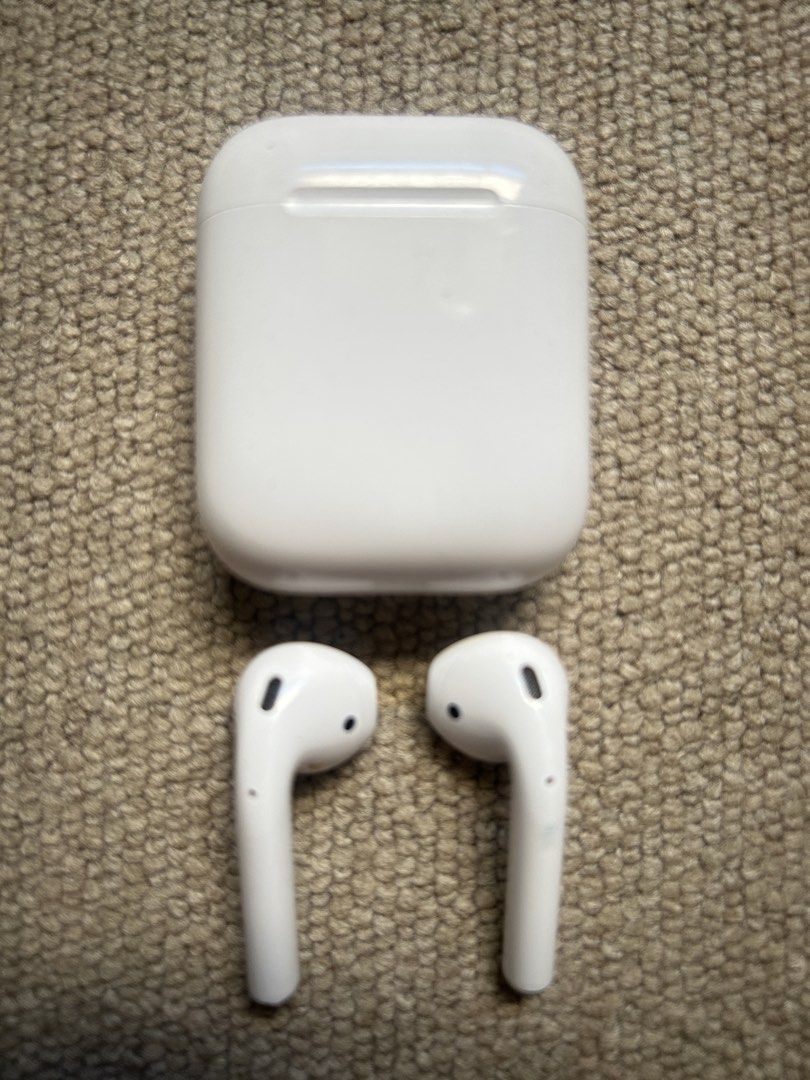 Apple AirPods (2nd Generation) with Charging Case (Category: Earphones) located in Muntinlupa City. Submitted by yellafella03501 (Listing ID 1456987708, Image 1). Description: - Apple AirPods 2nd Generation - Includes charging case - Excellent working condition - Case has minor cosmetic scuffs from normal use - Earbuds are clean - Ready for a new home!.