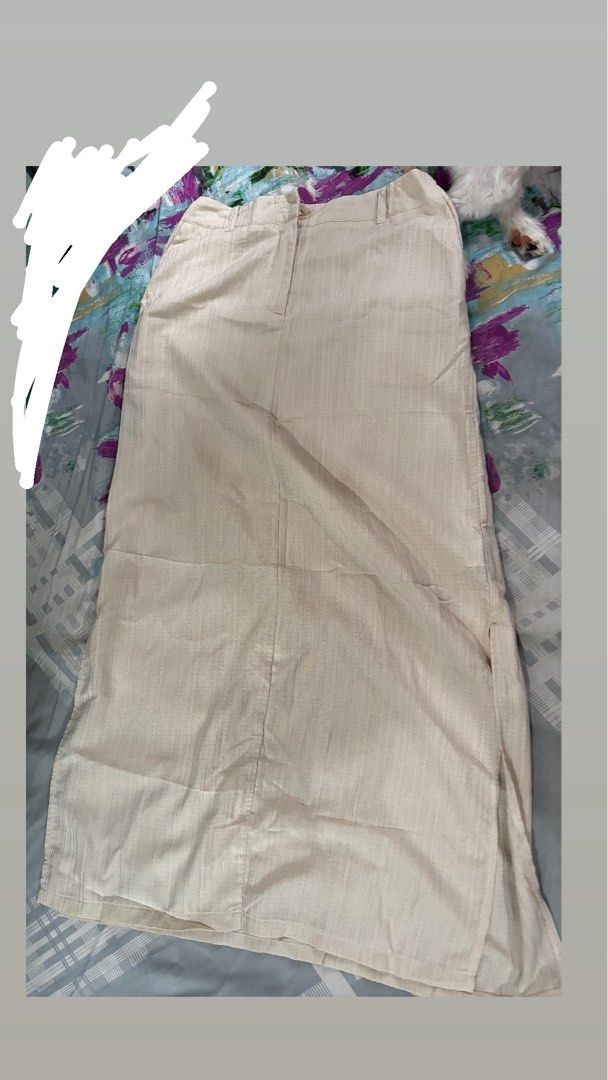 Apricot Textured Maxi Skirt with Side Slits (Category: Skirts) located in Marikina City. Submitted by minsh113 (Listing ID 1457021949, Image 2). Description: - Creamy apricot maxi skirt - Textured fabric for a nice feel - Slits on both sides for easy movement - Comfortable elastic waistband - Versatile: dress up or down - Perfect for summer days.