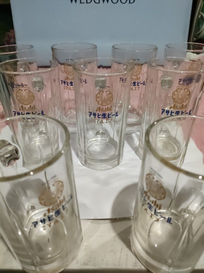 Asahi Beer Glass Mugs Set (Category: Other Kitchenware & Tableware) located in Bulacan. Submitted by hunterherojapanjdm (Listing ID 1457109251, Image 1). Description: - Set of 9 Asahi beer glass mugs - Features classic Asahi logo and Japanese text - Sturdy handles for a comfortable grip - Ideal for enjoying beer at home - Perfect for parties or personal use.