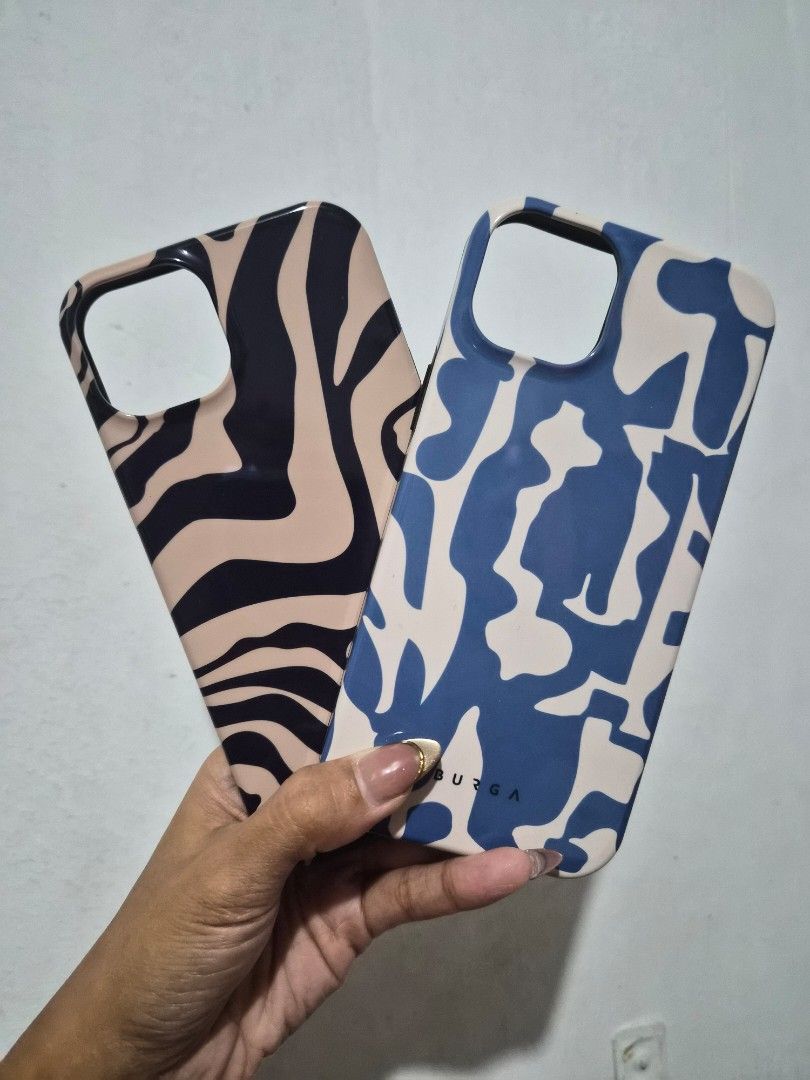 Authentic Burga Tough Magsafe for Iphone 15 Plus (Category: Cases & Sleeves) located in Cavite. Submitted by jemtamayo (Listing ID 1456251872, Image 1). Description: Take all of 1500!!! P800 each Original Price: P3000 ea 💯 original no box (does not come with any) slightly used few scratches at the back due to popsocket magsafe IMPORTANT NOTE: PLEASE DO NOT MAKE AN OFFER if you do not intend to pay and get the item ESPECIALLY IF IT IS ACCEPTED. L