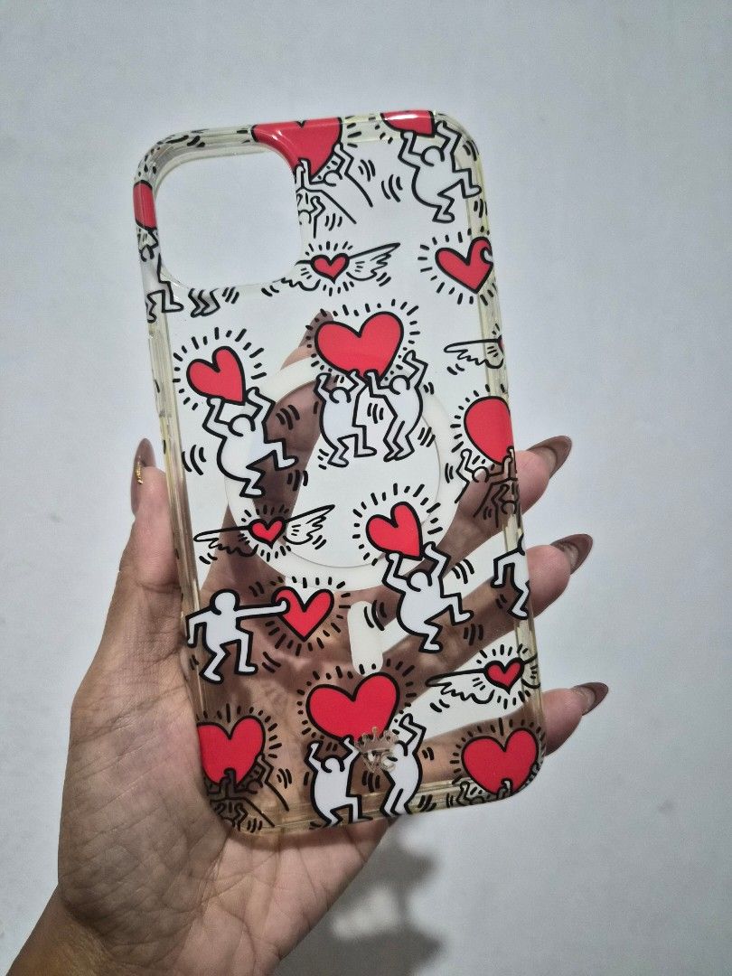 Authentic Velvet Caviar Keith Harring Phone Cases- Iphone 15 Plus (Category: Cases & Sleeves) located in Cavite. Submitted by jemtamayo (Listing ID 1456977034, Image 1). Description: 💯 original Velvet Caviar phone cases P600 each - Fits iPhone 15 Plus models - Case 1: Cute mushroom and fairy design with glitter- SOLD - Case 2: Keith Harring hearts IMPORTANT NOTE: If you see some signs of yellowing, it is because of the material and not the usage