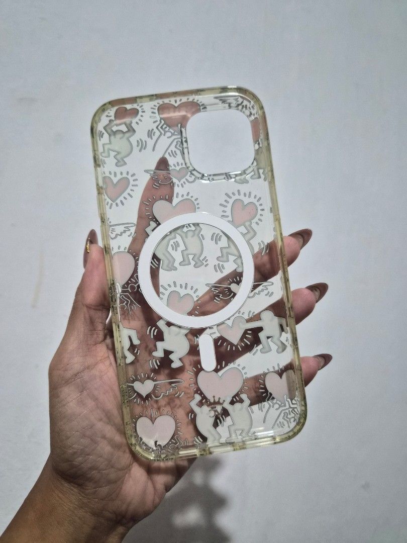 Authentic Velvet Caviar Keith Harring Phone Cases- Iphone 15 Plus (Category: Cases & Sleeves) located in Cavite. Submitted by jemtamayo (Listing ID 1456977034, Image 2). Description: 💯 original Velvet Caviar phone cases P600 each - Fits iPhone 15 Plus models - Case 1: Cute mushroom and fairy design with glitter- SOLD - Case 2: Keith Harring hearts IMPORTANT NOTE: If you see some signs of yellowing, it is because of the material and not the usage
