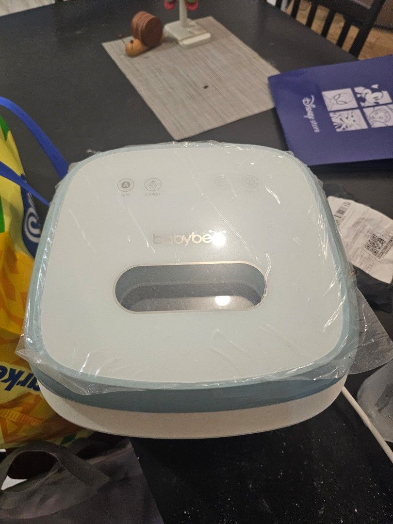 Baby Bee UV Sterilizer (Category: Breastfeeding & Bottle Feeding) located in Manila. Submitted by nicolealison (Listing ID 1456980094, Image 1). Description: complete with box and manual new filter and extra filter included can send video to check if working.