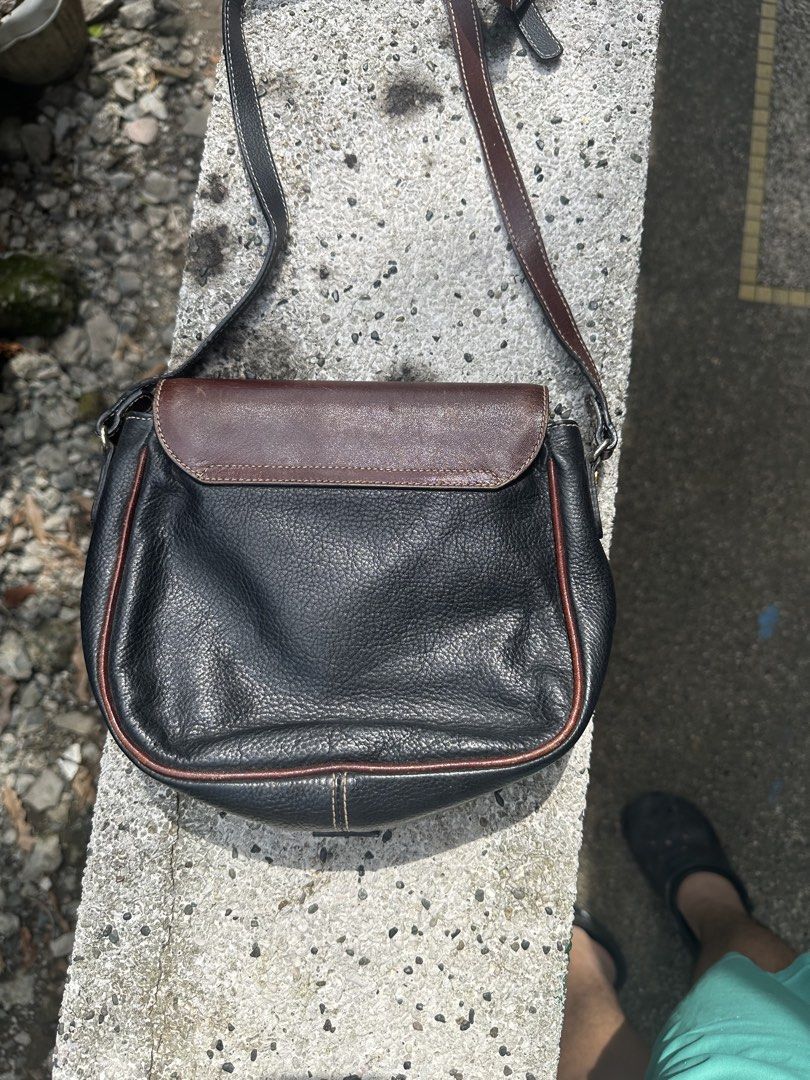 Bally Leather Shoulder Bag (Category: Luxury Bags & Wallets) located in Pasig City. Submitted by lancer501 (Listing ID 1456973987, Image 3). Description: - Vintage Bally shoulder bag - Classic two-tone design: brown and black leather - Adjustable shoulder strap - A timeless addition to any collection -shipping shouldered by buyer.