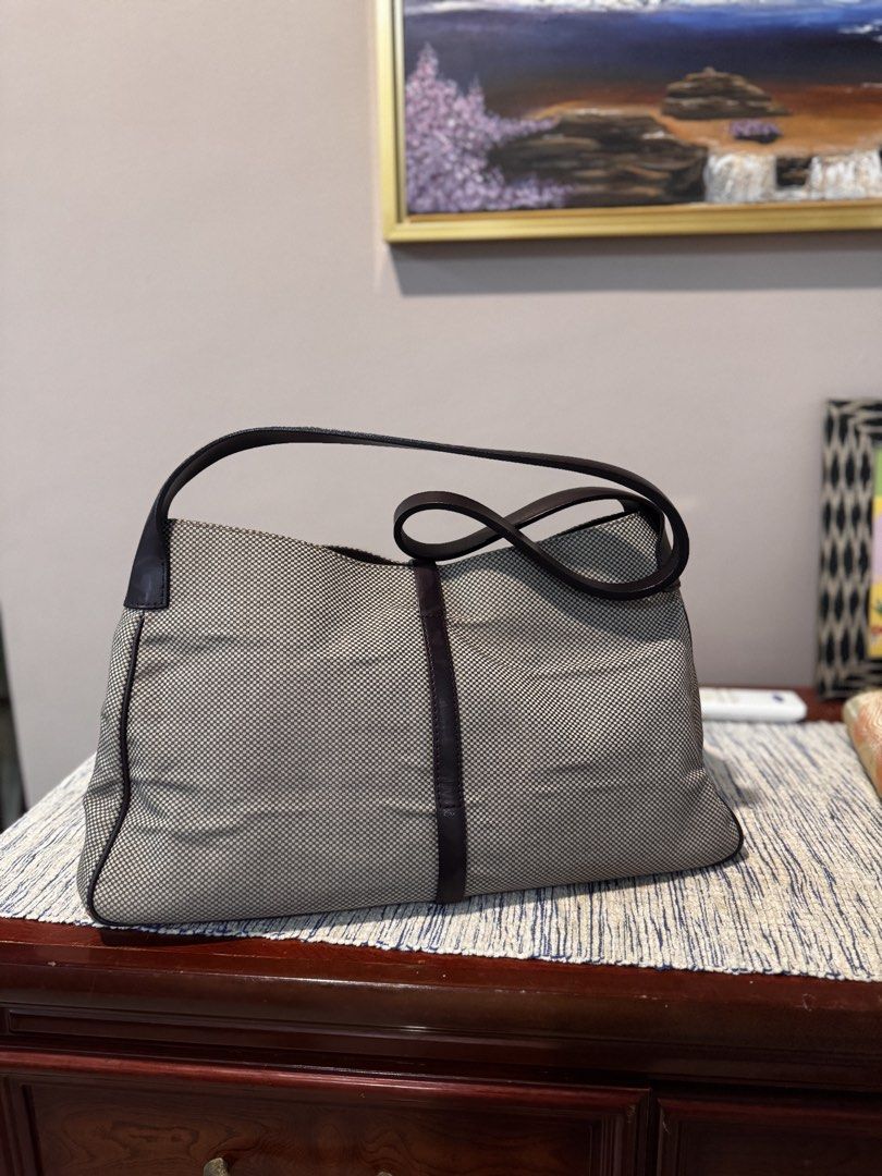 BALLY original medium shoulder bag (Category: Luxury Bags & Wallets) located in Davao. Submitted by bargainbuddies2021 (Listing ID 1457101970, Image 3). Description: Original medium bakly shoulder bag Dimes: H: 8 inch x L: 14 inch x W: 9 inch Strap: 14 inches.