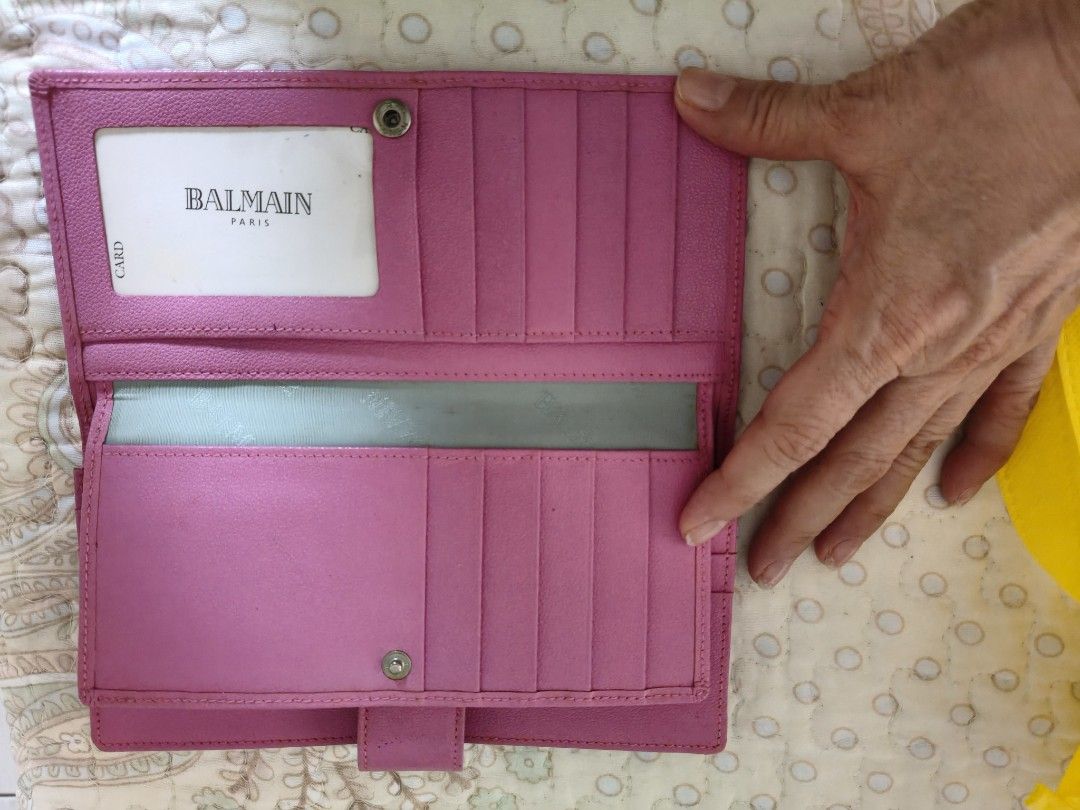 Balmain Paris Pink Leather Long Wallet (Category: Luxury Bags & Wallets) located in Paranaque City. Submitted by onlineshopwithsec (Listing ID 1456991206, Image 3). Description: - Authentic Balmain Paris long wallet - Vibrant bright pink leather - Convenient back zip pocket - Multiple interior card slots - Spacious bill compartment - Secure snap button closure - Plenty of life left, great value!.