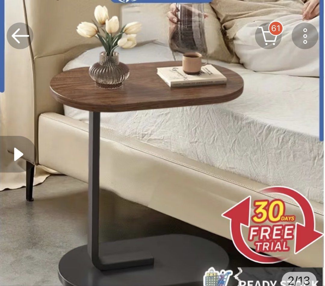 Side Table (Category: Tables & Sets) located in Singapore. Submitted by beigepoppies (Listing ID 1456974414, Image 1). Description: Side/bedside table that can be used for putting laptop, food etc near your sofas or beds Selling cause I don’t really use it - in good condition and selling for cheap Walnut + black coloured Measurements in pics Self collect around Bukit Panjang area or arrange your own delivery!.
