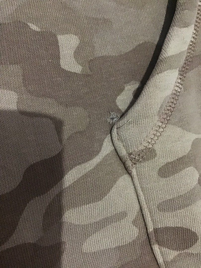 Bee Inspired Camo Hoodie Size L (Category: Coats, Jackets and Outerwear) located in Manila. Submitted by sandobag (Listing ID 1457054299, Image 3). Description: - W 21.5 L 29 Good condition Color rate:9.8/10 Issue nasa pic. - Bee Inspired Brown Camouflage Hoodie - Size: Large (L) - Material: 65% Cotton, 35% Polyester - Features: Front pocket, hood - Condition: Small tear near pocket area (refer to last photo for detail).