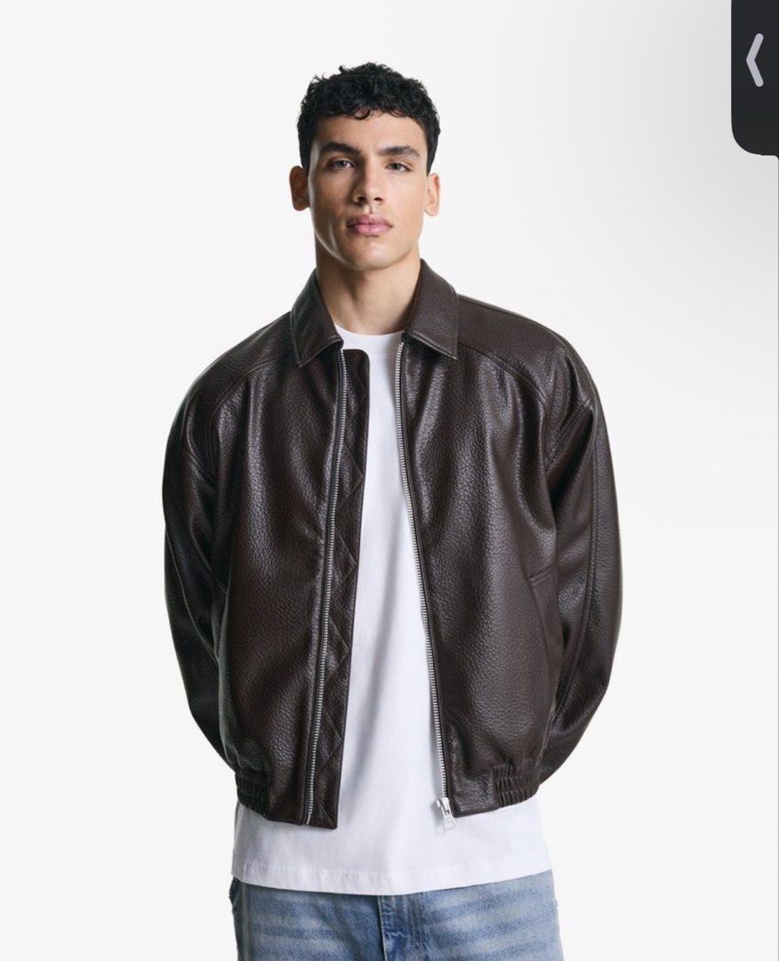 Bershka Brown Faux Leather Bomber Jacket (Category: Coats, Jackets and Outerwear) located in Caloocan City. Submitted by jollyrose_ (Listing ID 1456984492, Image 1). Description: - Bershka brown faux leather bomber jacket - Zip-up front closure - Two convenient side pockets - Versatile: pairs well with jeans or can be dressed up - Ideal for cooler weather SIZE LARGE .