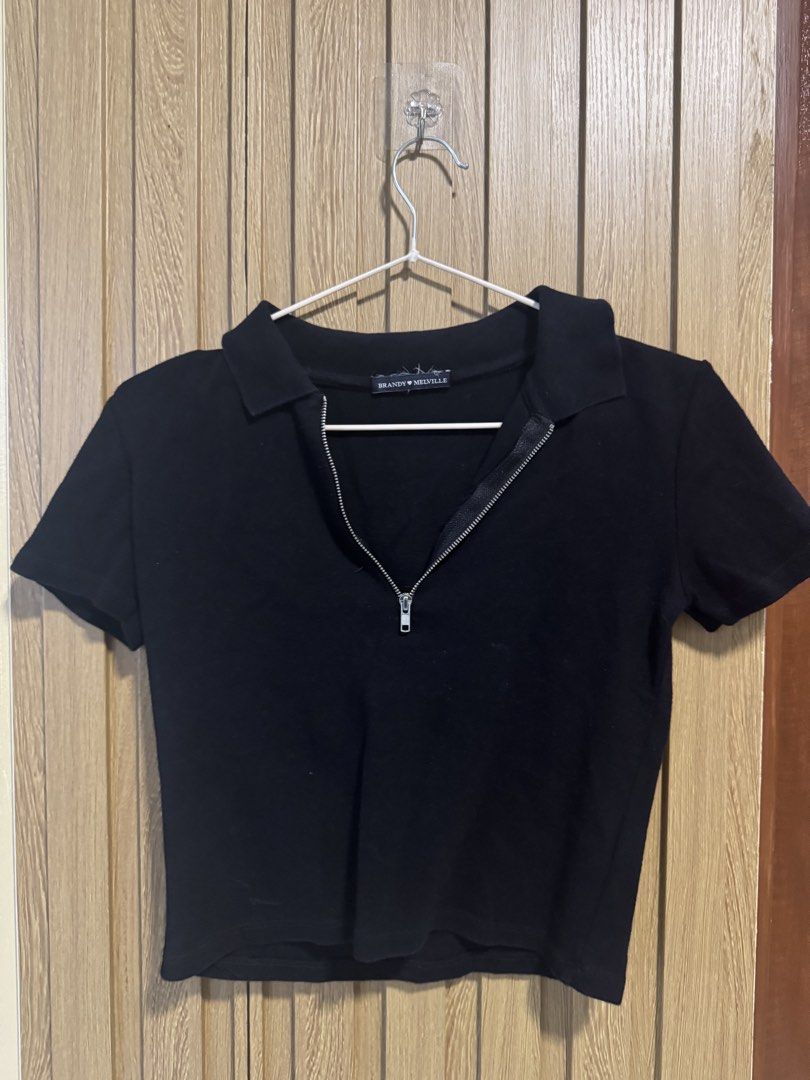 Brandy Melville Black Zip-Up Shirt (Category: Blouses) located in Paranaque City. Submitted by prelovedbye__ (Listing ID 1457084384, Image 1). Description: Fits XS-S.