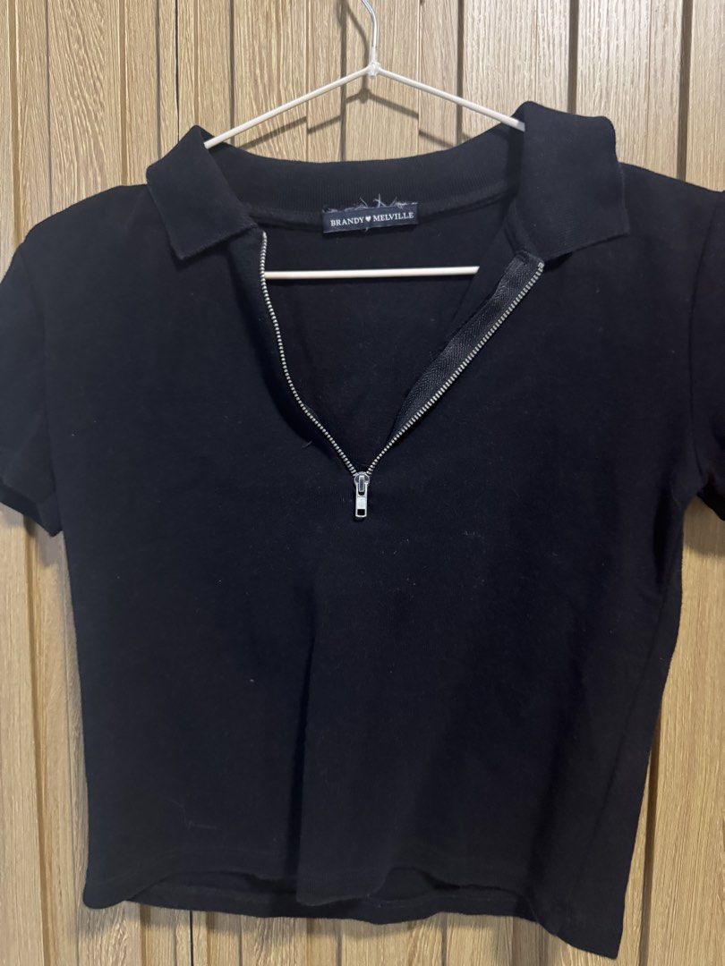 Brandy Melville Black Zip-Up Shirt (Category: Blouses) located in Paranaque City. Submitted by prelovedbye__ (Listing ID 1457084384, Image 3). Description: Fits XS-S.