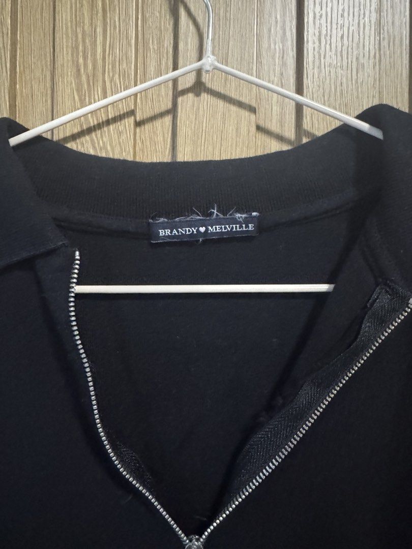 Brandy Melville Black Zip-Up Shirt (Category: Blouses) located in Paranaque City. Submitted by prelovedbye__ (Listing ID 1457084384, Image 2). Description: Fits XS-S.