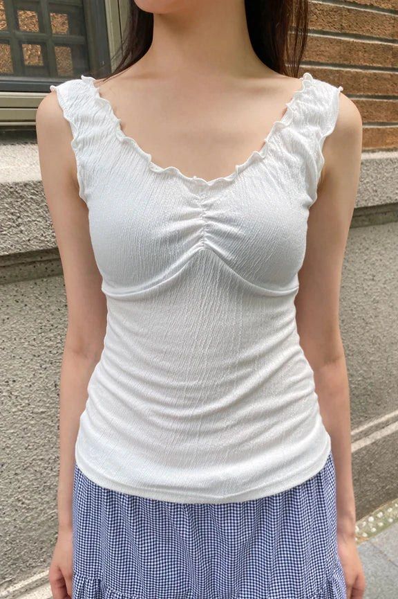 Brandy Melville Malena Top in White (Category: Sleeveless) located in Quezon City. Submitted by jjccly (Listing ID 1457126482, Image 1). Description: personal pre-loved please manage your expectations! bought in tokyo tag is slightly damaged mop gcash mod lalamove/j&t loc qc.