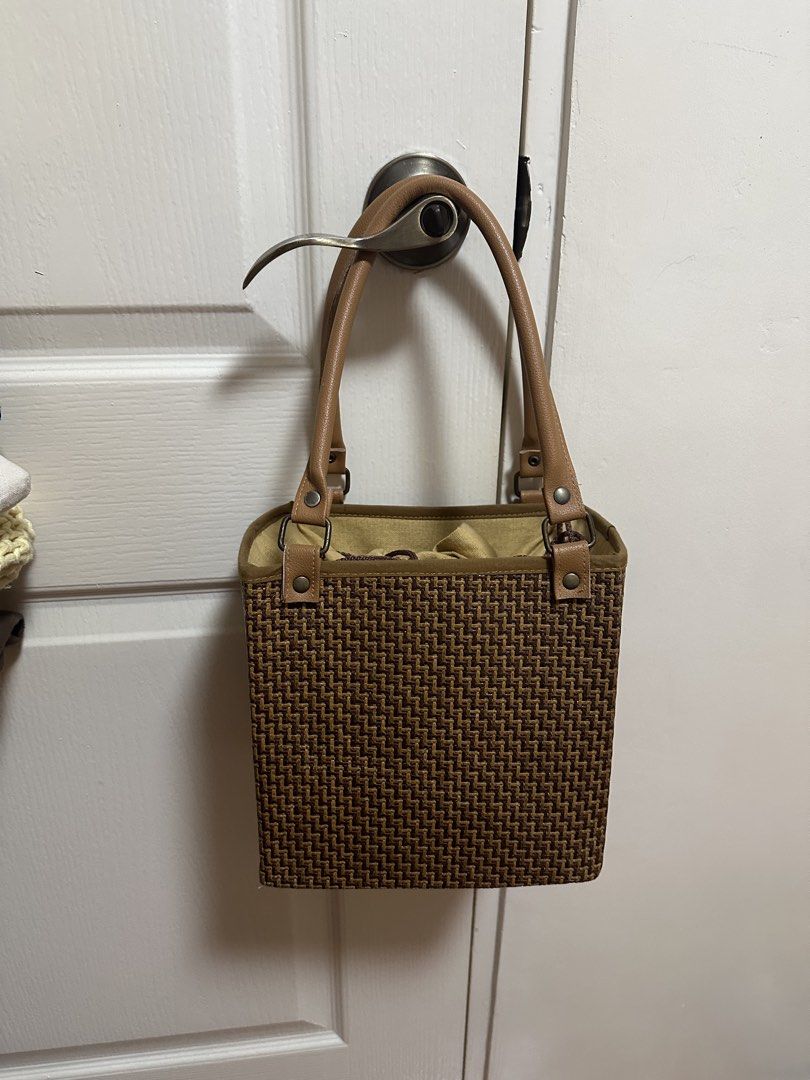 Brown woven/rattan basket bag (Category: Beach Bags) located in Quezon City. Submitted by declutters.bianca (Listing ID 1457129519, Image 2). Description: Brown woven/rattan basket bag Bought from Thailand (850 pesos) rfs: decluttering 📍qc/makati/bgc.
