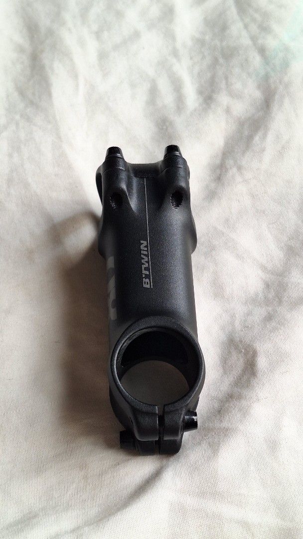 Btwin 80mm Bicycle Stem (Decathlon) (Category: Bicycles) located in Marikina City. Submitted by thesecondroomph (Listing ID 1456983932, Image 2). Description: - B'Twin Bicycle Stem - Color: Black - Material: Aluminum - Length: 80mm - Condition: Used, with minor rust (see photo) - Ideal for: New bike builds or upgrades - Sold as is.