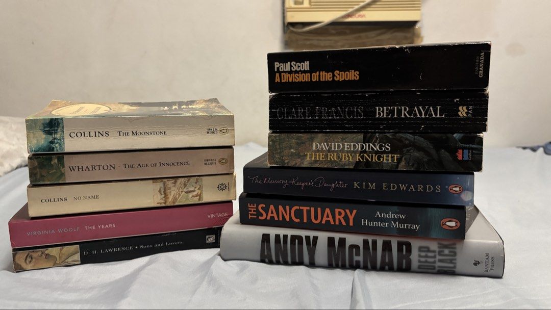 BUNDLE! THRILLER AND CLASSICS (Category: Storybooks) located in Calamba. Submitted by rihanna.sells (Listing ID 1457109566, Image 1). Description: - Bundle of 10 books - Includes classics and thrillers - Authors: Paul Scott, Clare Francis, David Eddings, Kim Edwards, Andrew Hunter Murray, Andy McNab, Virginia Woolf, D. H. Lawrence, Edith Wharton, Wilkie Collins - Great reads for any book lover - Some wear on covers, pages are clean.