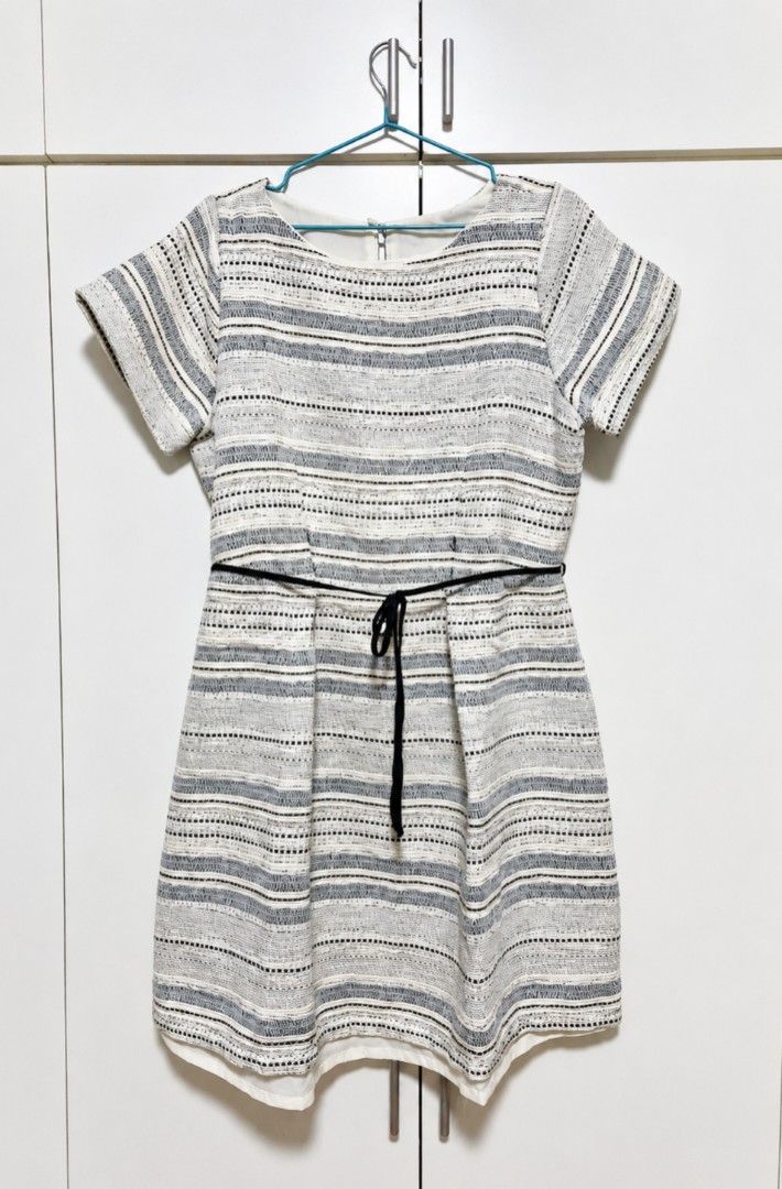 Cream with stripe dress (Category: Dresses) located in Manila. Submitted by sorayabarr50152 (Listing ID 1431301636, Image 1). Description: Dress features a striped pattern in neutral tones. It has short sleeves and a fitted waist, accentuated by a black belt. It can fit Large to XL..