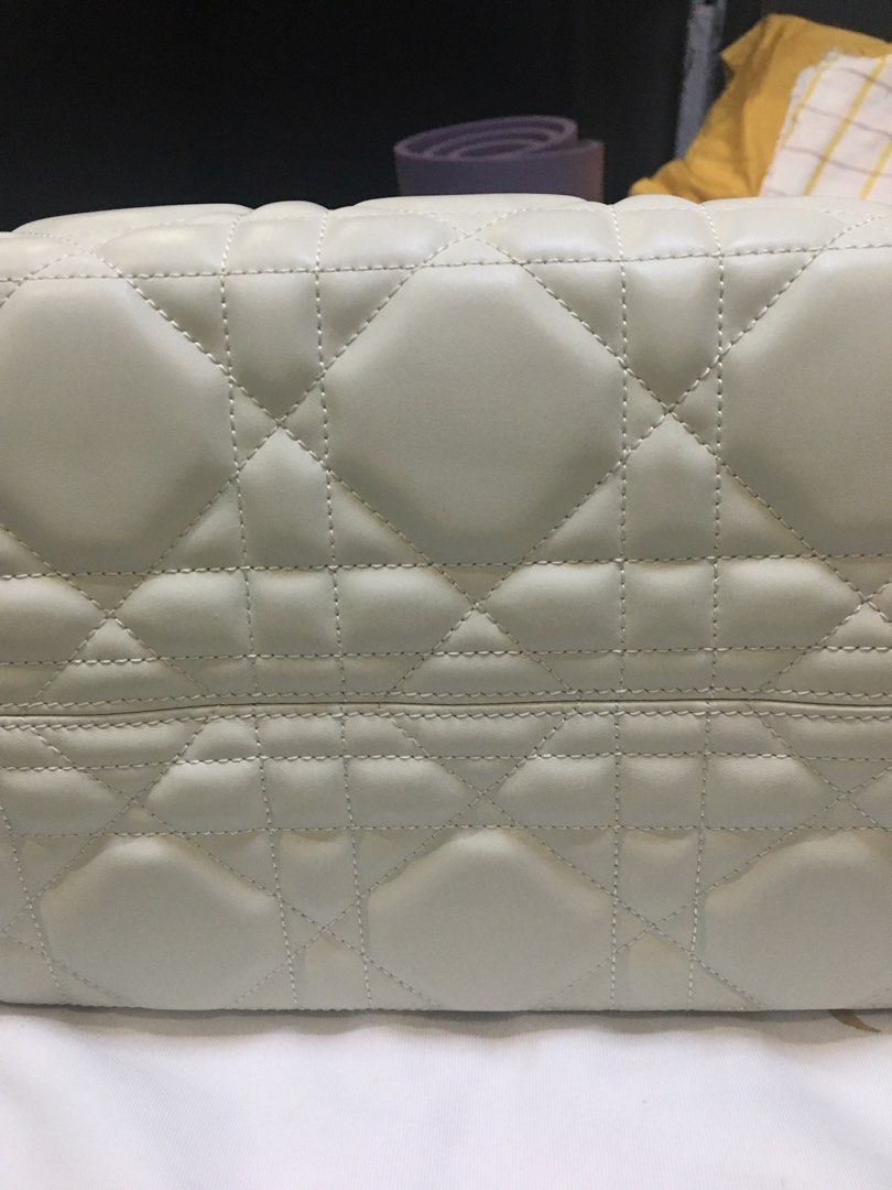 CD (Category: Luxury Bags & Wallets) located in San Pedro. Submitted by ginasantiago (Listing ID 1451075656, Image 3). Description: Off white With pouch Medium size With dustbag Free shipping.